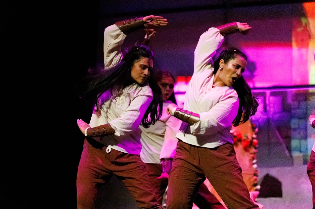 TAMU Akh Mastani dancers performing dynamic stage choreography
