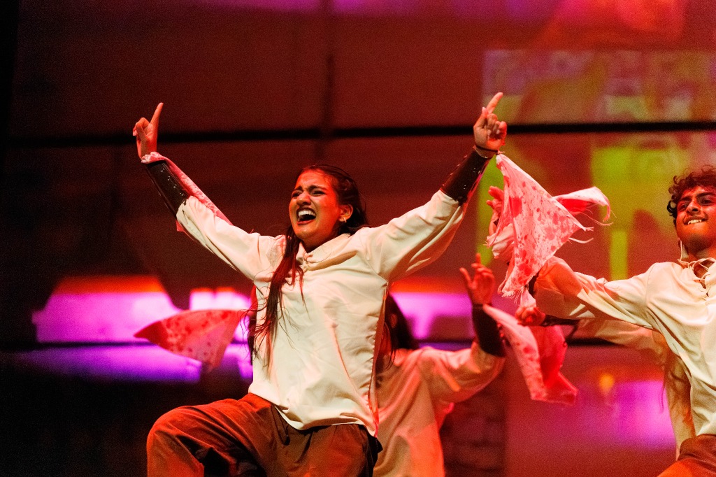 TAMU Akh Mastani female dancer performing choreography on stage